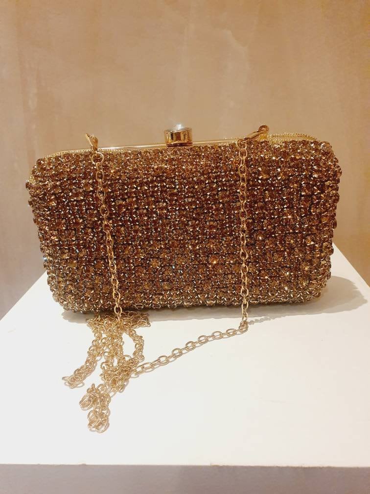 Gold wristlet hotsell clutch
