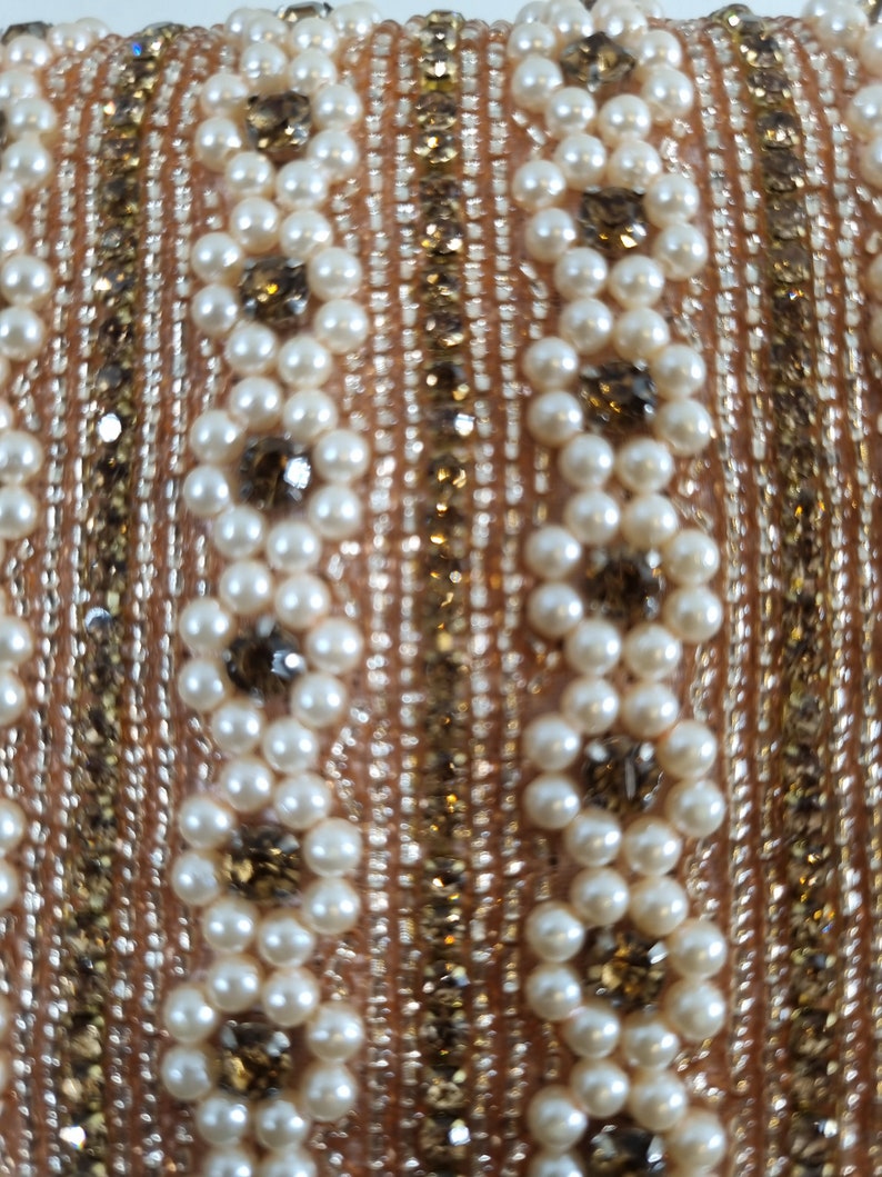 Our Pearl clutch purse collection. A beautiful design in pearl and gold. image 5