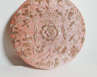 Unique round bag with detachable chain. A peach pink with stitched gold embroidery! Available in 5 colours.