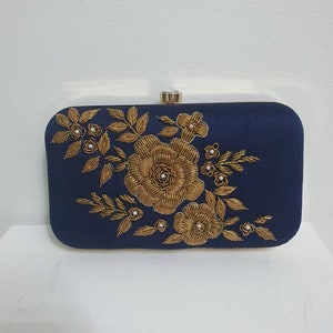 Navy and floral clutch purse