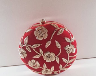 Beautiful red clutch purse with gold detail