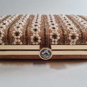 Our Pearl clutch purse collection. A beautiful design in pearl and gold. image 6