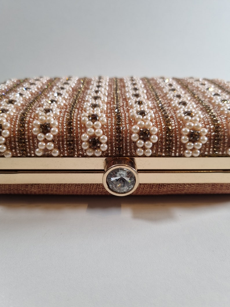 Our Pearl clutch purse collection. A beautiful design in pearl and gold. image 6
