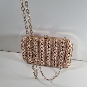 Our Pearl clutch purse collection. A beautiful design in pearl and gold. image 1