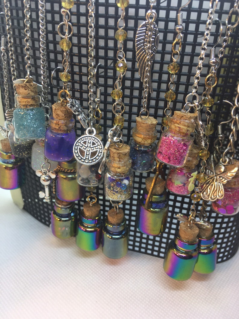 Tiny assortment of filled jars and charms