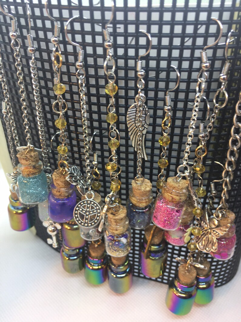 Tiny assortment of filled jars and charms