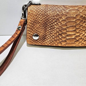 Cartera de mano larga de piel auténtica para mujer.