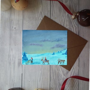 Biglietto di auguri natalizio piegato nordico con busta renna Babbo Natale scandinavo illustrazione originale accogliente biglietto di auguri per le vacanze inverno tradizionale
