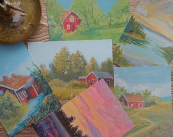 May include: A collection of small landscape paintings featuring red houses, trees, and bodies of water. The paintings are in various styles, with a focus on natural scenes and a rustic aesthetic. The color palette includes greens, blues, reds, and yellows.
