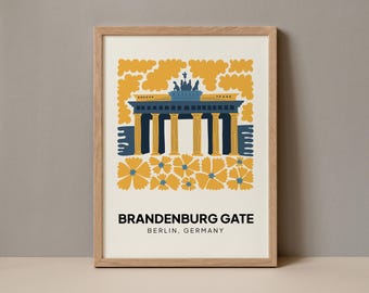 May include: A print of the Brandenburg Gate in Berlin, Germany, with a yellow floral design. The text "Brandenburg Gate" and "Berlin, Germany" is below the image.