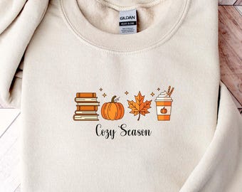 Sudadera acogedora de temporada, regalo de otoño para amantes de los libros, camiseta de temporada de calabaza, camiseta de calabaza linda, camiseta de hoja de otoño, camiseta de café de otoño, camiseta de calabaza