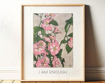 以下が含まれることがあります： ピンクの花と緑の葉の植物画が描かれた、額入りのアートプリント。アートワークには「I AM ENOUGH」の文字が含まれています。プリントは、ミニマリストスタイルで、明るい木製のフレームに収められています。