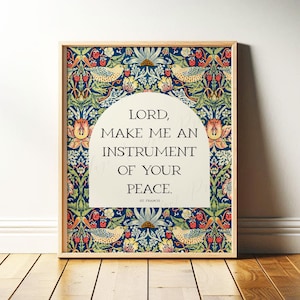 May include: Framed art print featuring the quote "Lord, make me an instrument of your peace." The artwork has a decorative floral and bird pattern in shades of blue, red, yellow, and green. The text is in a white arched shape.