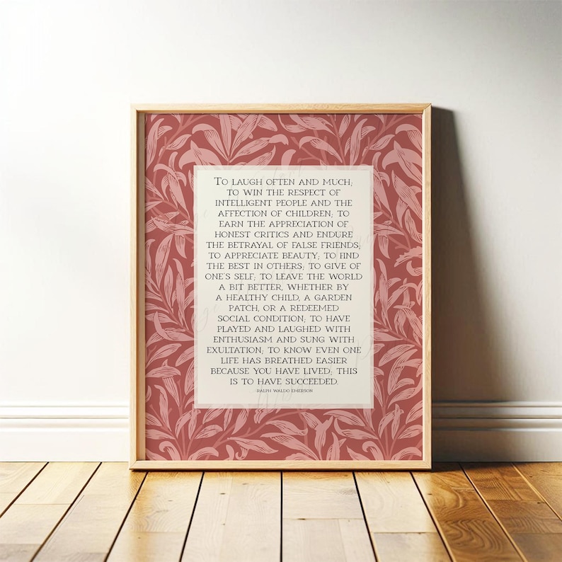 Ralph Waldo Emerson "Success" poem written in light beige center rectangle with a red floral William Morris background. Pictured in thin wood frame.