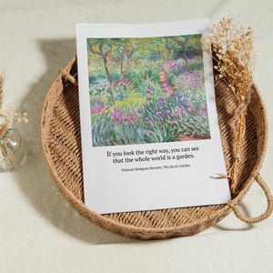 Unframed print of quote from The Secret Garden in boho interior, with pastel vintage art from Monet