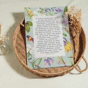 Print of Ralph Waldo Emerson Success poem written in a white center rectangle, surrounded by a background of light blue with vintage floral artwork. Pictured as fine art print.