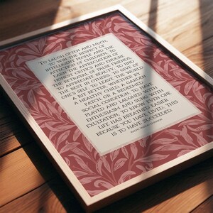 Ralph Waldo Emerson "Success" poem written in light beige center rectangle with a red floral William Morris background. Pictured in thin wood frame.
