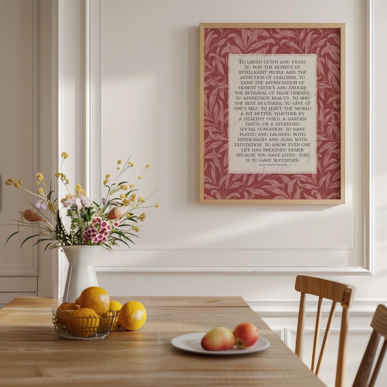Ralph Waldo Emerson "Success" poem written in light beige center rectangle with a red floral William Morris background. Pictured in wood frame.