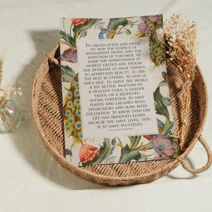 Art print of Ralph Waldo Emerson's Success quote - pictured in an uppercase serif font in a large beige rectangle in the middle of a background of an mid century peacock pattern.