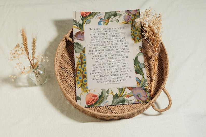 Art print of Ralph Waldo Emerson's Success quote - pictured in an uppercase serif font in a large beige rectangle in the middle of a background of an mid century peacock pattern.