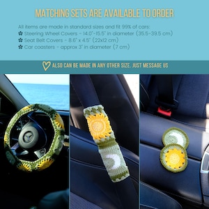 May include: A set of crochet car accessories, including a steering wheel cover, seat belt covers, and car coasters. The items feature a sunflower design with yellow and green colors. The steering wheel cover fits 14.0"-15.5" diameter wheels.