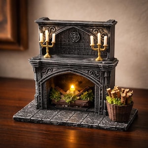 May include: A miniature fireplace with a stone-like appearance. The fireplace has a decorative arch, a glowing faux fire, and two golden candle holders with white candles. A small basket of wooden logs sits to the side, adding to the cozy aesthetic.