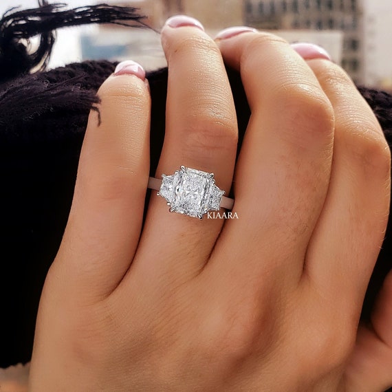 Radiant three stone ring discount