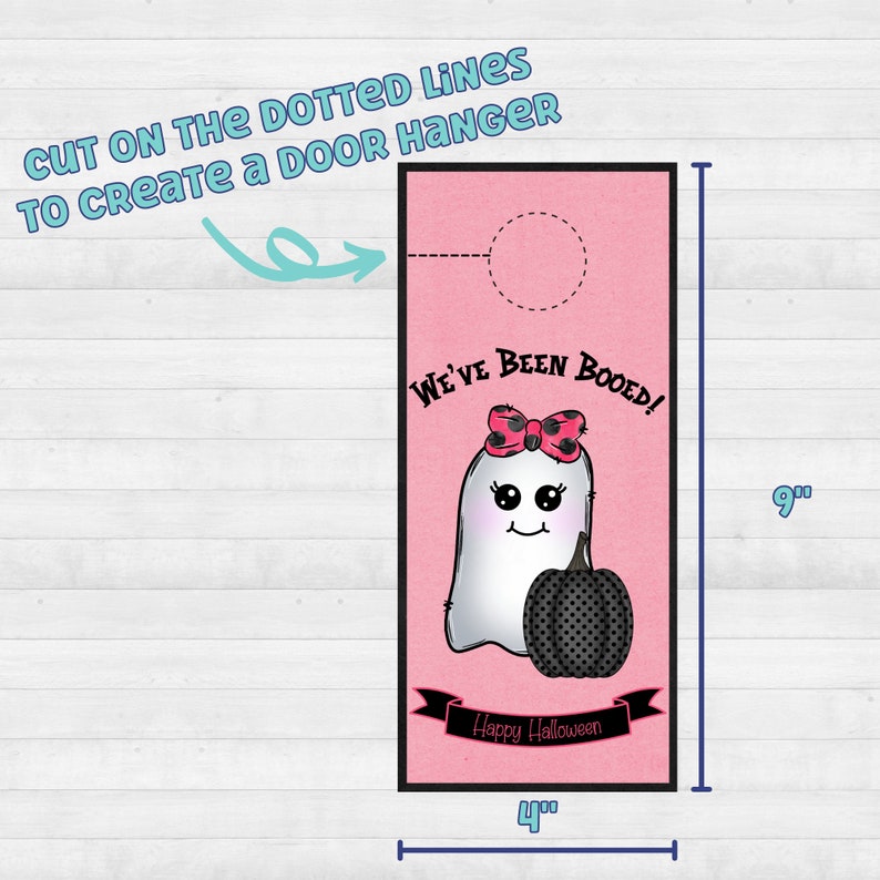 May include: A pink door hanger with a ghost holding a pumpkin. The ghost has a pink bow with black polka dots. The text on the door hanger reads "We've Been Booed!" and "Happy Halloween". The door hanger is 9 inches tall and 4 inches wide.