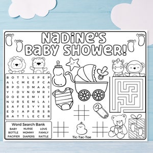May include: A black and white printable baby shower game featuring a word search puzzle with the words "bottle", "pacifier", "diapers", "rattle", "baby", "nurse", "mommy", "love", and "family". The game also includes a tic-tac-toe board, a maze, and several cute illustrations of baby animals and baby items.