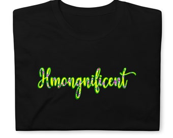 May include: Black t-shirt with the text "Hmongnificent" in green and yellow lettering with a floral pattern.