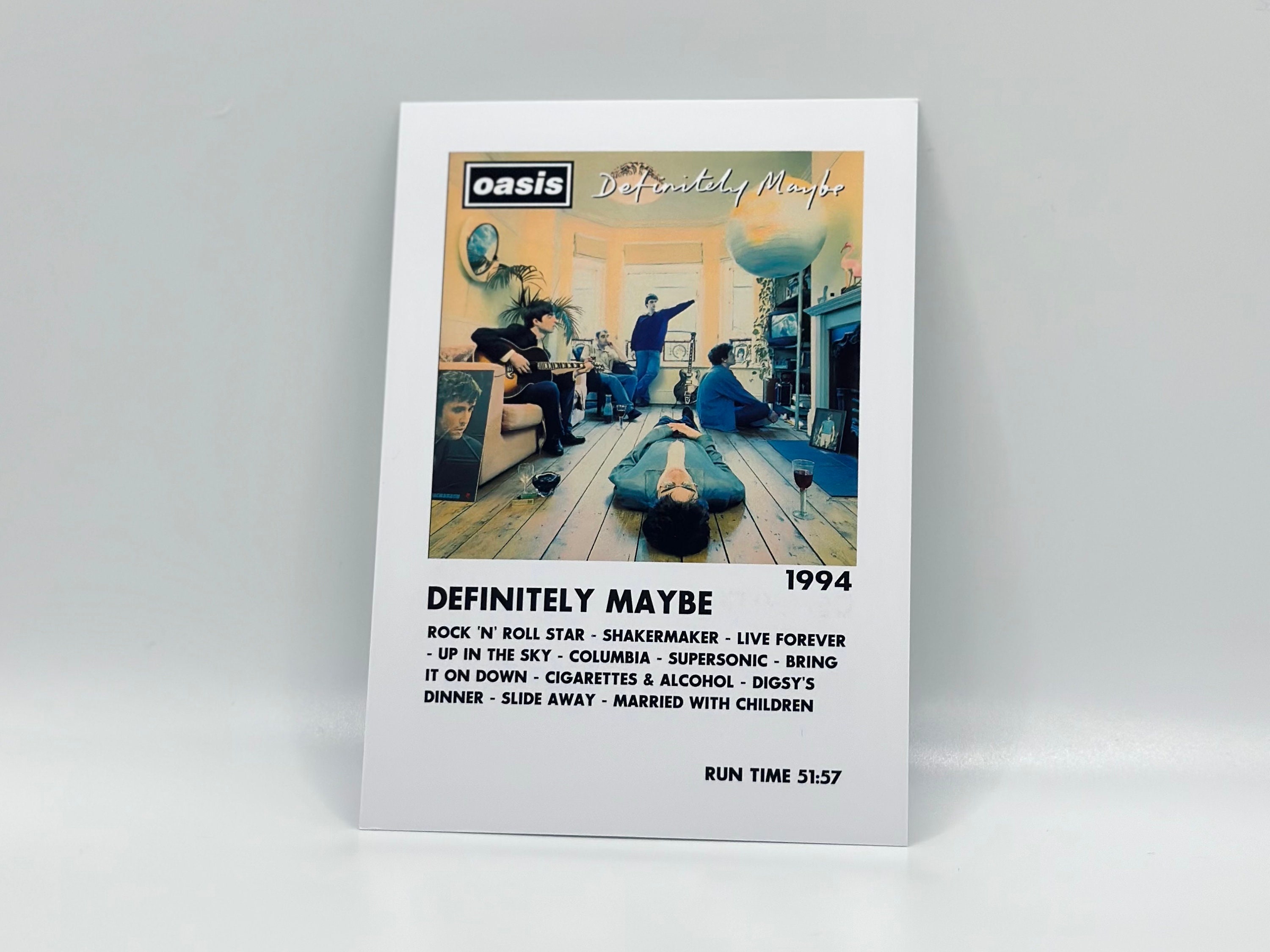 Oasis Album digital incluye tarjetas de descarga cuando usted