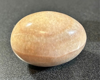 Polished Peach Moonstone egg.  3” long