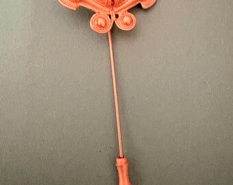 This is a copper- or rose-gold-tone metal stick pin (also called a lapel pin, hat pin, or stickpin) with an abstract butterfly