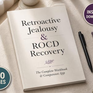 May include: A softcover workbook titled Retroactive Jealousy & ROCD Recovery: The Complete Workbook & Companion App. The cover is off-white with black and purple text, featuring a small leaf graphic. A black pen rests beside the book.