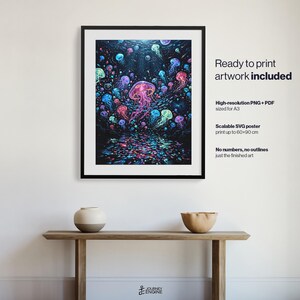 May include: A framed digital art print featuring a vibrant underwater scene filled with glowing pink, blue, and purple jellyfish against a dark background. The text on the right specifies ready to print artwork, high-resolution PNG and PDF files sized for A3, and a scalable SVG poster for prints up to 60 by 90 cm.