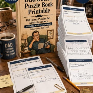 May include: A "Dad Jokes Puzzle Book Printable" with 100 pages, featuring fill-in-the-blank and cryptogram puzzles. Includes a "Dad Edition" and "Answer Key Included" text. Also, a mug that says "Dad. The Man. The Myth. The Legend."