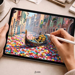 May include: A digital tablet displaying a pixel art illustration of a gondola floating on a canal in Venice, surrounded by a vibrant field of colorful flowers. The screen shows a detailed scene with buildings lining the water, rendered in a blocky, mosaic-like style with a white stylus held over the display.