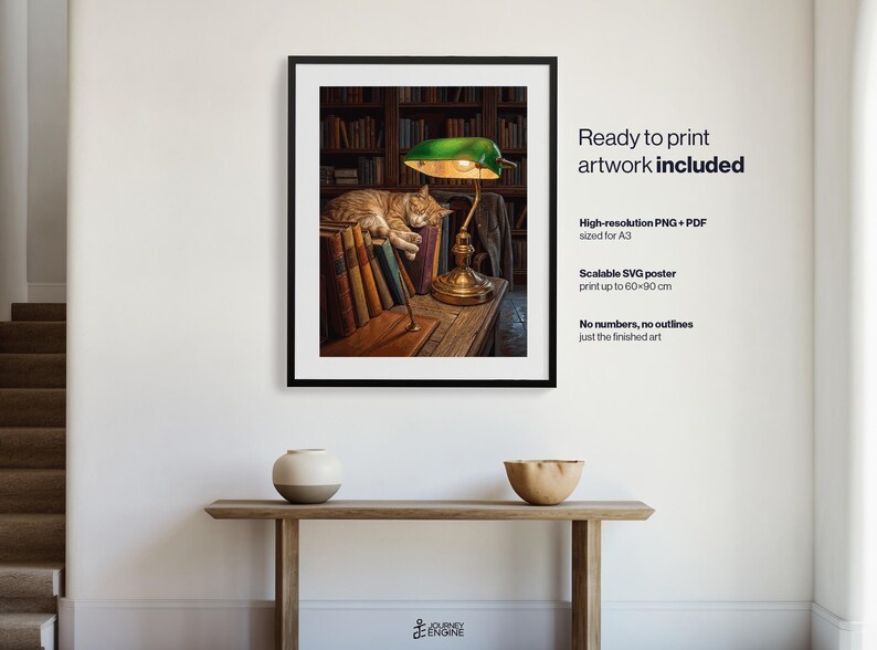 May include: A framed wall art print featuring a ginger cat sleeping on a stack of books next to a green banker lamp in a library setting. The text reads: Ready to print artwork included, High-resolution PNG + PDF sized for A3, Scalable SVG poster print up to 60x90 cm, No numbers, no outlines just the finished art.