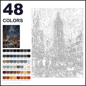 May include: A paint-by-numbers kit featuring a 48-colour palette and a numbered outline of a rainy New York City street scene with a skyscraper, yellow taxi, and pedestrians. The set includes a small reference image of the finished artwork.