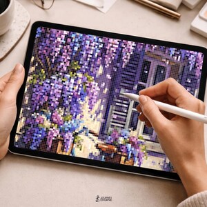 May include: A digital tablet displaying a pixel art illustration of purple wisteria flowers cascading over a window with dark shutters. The screen shows a vibrant mosaic of purple, blue, and green squares, with a white stylus held against the display.