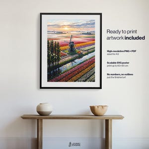 May include: A framed wall art print featuring a vibrant landscape of colorful tulip fields, a traditional windmill, and a canal at sunrise. The text reads: Ready to print artwork included, High-resolution PNG + PDF sized for A3, Scalable SVG poster print up to 60x90 cm, No numbers, no outlines just the finished art.