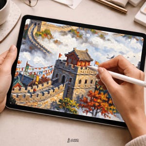 May include: A digital tablet displaying a pixel art illustration of the Great Wall of China. The artwork features a stone watchtower, winding wall sections, and autumn-colored trees under a cloudy sky. A white stylus is held against the screen.