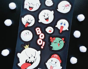 May include: A sheet of stickers featuring various cartoon ghosts with different expressions. The stickers are white with black outlines and red accents, set against a black background. The word "BOO!" is also featured. The text "@Comet Sams" is at the bottom.