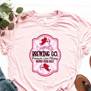Cupids Brewing Co Premium Love Potion Shirt, Cupids Brewing Co T-Shirt, Cupid’s Brewing Co Tee, Valentines Day Cupid Shirt, Valentine Gift