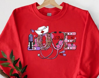 Felpa infermiera amore, felpa infermieristica, maglione regalo infermiera di San Valentino, maglietta infermiera amorevole, camicia regalo infermiera infermiera, felpa con cappuccio infermiera
