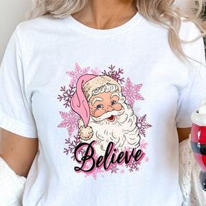 Weihnachten Believe Shirt, Santa Believe Shirt, Santa Claus Shirt, Pink Santa T-Shirt, Pink Santa T-Shirt, Pink Christmas Shirts, Cute Santa Tee