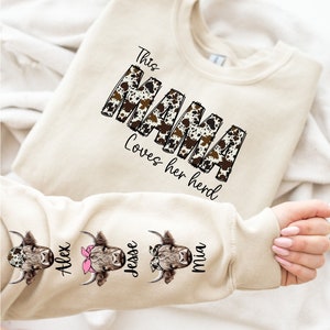 Mama Loves Her Herd Sweatshirt, Custom Cow Shirts, Personalized Sleeve Mom Gifts, Mothers Day Gift, Grandma Sweatshirt, Cow Print Mama Shirt