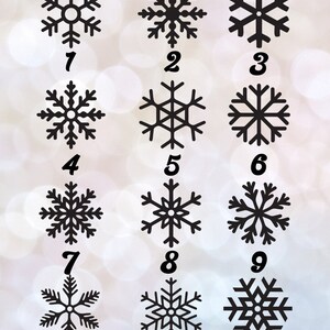 May include: A set of 12 black snowflake designs numbered 1 through 12. The snowflakes are all different designs and are arranged in a grid.