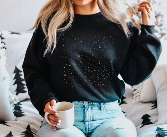 Black sweater with gold stars best sale