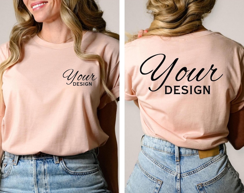 May include: A light pink t-shirt with the words "Your Design" printed on the front and back in a black script font. The shirt is paired with blue denim jeans.